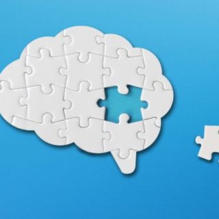 A brain with a puzzle piece missing